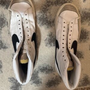 Woman’s White and Black High-Top Sneakers Nike